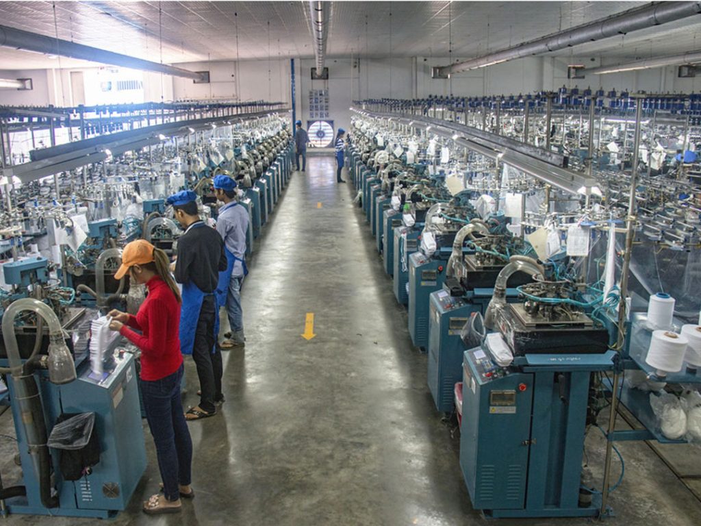 Experienced production team manufacturing custom wool socks